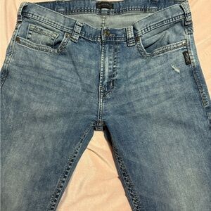 Silver Jeans Men's Denim in Light and Dark Blue
